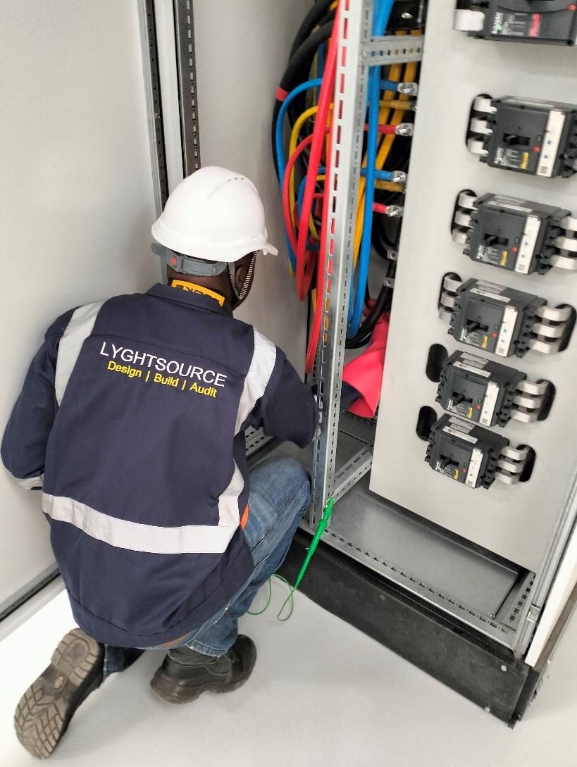 Lyghtsource engineer at work on site